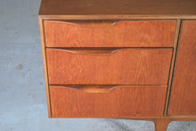 Load image into Gallery viewer, A Mid Century Dunvegan teak sideboard designed by Tom Robertson and manufactured by A.H. McIntosh of Kirkcaldy, Scotland, circa 1960s.