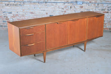 Load image into Gallery viewer, A Mid Century Dunvegan teak sideboard designed by Tom Robertson and manufactured by A.H. McIntosh of Kirkcaldy, Scotland, circa 1960s.