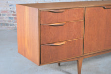Load image into Gallery viewer, A Mid Century Dunvegan teak sideboard designed by Tom Robertson and manufactured by A.H. McIntosh of Kirkcaldy, Scotland, circa 1960s.