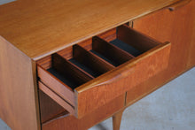 Load image into Gallery viewer, A Mid Century Dunvegan teak sideboard designed by Tom Robertson and manufactured by A.H. McIntosh of Kirkcaldy, Scotland, circa 1960s.