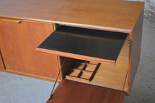 Load image into Gallery viewer, A Mid Century Dunvegan teak sideboard designed by Tom Robertson and manufactured by A.H. McIntosh of Kirkcaldy, Scotland, circa 1960s.