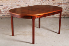 Load image into Gallery viewer, Swedish Mid Century rosewood dining table by Nils Jonsson for Troeds, circa 1970s.