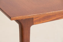 Load image into Gallery viewer, A British Mid Century teak extending dining table and four chairs designed by McIntosh, Scotland circa 1960s.