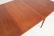 Load image into Gallery viewer, A British Mid Century teak extending dining table and four chairs designed by McIntosh, Scotland circa 1960s.