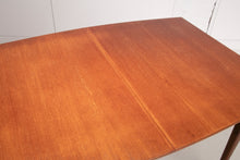 Load image into Gallery viewer, A British Mid Century teak extending dining table and four chairs designed by McIntosh, Scotland circa 1960s.