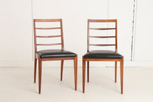 Load image into Gallery viewer, A British Mid Century teak extending dining table and four chairs designed by McIntosh, Scotland circa 1960s.