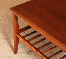 Load image into Gallery viewer, Mid Century rectangular coffee table with a magazine rack, circa 1960s
