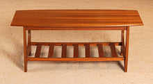 Load image into Gallery viewer, Mid Century mahogany coffee table with a magazine rack, circa 1960s

