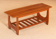 Load image into Gallery viewer, Mid Century mahogany coffee table with a magazine rack, circa 1960s
