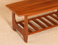 Load image into Gallery viewer, Mid Century mahogany coffee table with a magazine rack, circa 1960s
