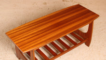 Load image into Gallery viewer, Mid Century mahogany coffee table with a magazine rack, circa 1960s
