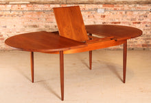 Load image into Gallery viewer, A mid century G Plan Fresco extending oval teak dining table, circa 1960s
