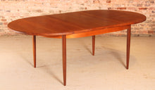 Load image into Gallery viewer, A mid century G Plan Fresco extending oval teak dining table, circa 1960s
