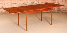 Load image into Gallery viewer, Danish Mid Century extending teak dining table, circa 1970s
