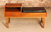 Load image into Gallery viewer, Mid Century teak telephone seat with a black vinyl seat and a drawer, circa 1960s
