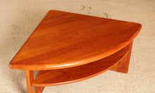 Load image into Gallery viewer, Danish Mid Century solid teak corner / coffee table with a magazine shelf by S. Burchardt-Nielsen, circa 1970s

