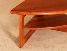 Load image into Gallery viewer, Danish Mid Century solid teak corner / coffee table with a magazine shelf by S. Burchardt-Nielsen, circa 1970s
