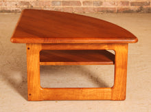 Load image into Gallery viewer, Danish Mid Century solid teak corner / coffee table with a magazine shelf by S. Burchardt-Nielsen, circa 1970s
