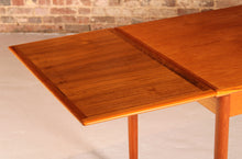 Load image into Gallery viewer, Danish Mid Century extending teak dining table, circa 1970s
