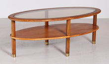 Load image into Gallery viewer, Mid Century oval 2-tier teak coffee table with a smoked glass top and brass feet by G-plan, circa 1970s
