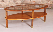 Load image into Gallery viewer, Mid Century oval 2-tier teak coffee table with a smoked glass top and brass feet by G-plan, circa 1970s
