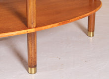 Load image into Gallery viewer, Mid Century oval 2-tier teak coffee table with a smoked glass top and brass feet by G-plan, circa 1970s
