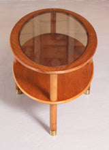 Load image into Gallery viewer, Mid Century oval 2-tier teak coffee table with a smoked glass top and brass feet by G-plan, circa 1970s
