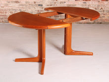 Load image into Gallery viewer, Danish Mid Century extending teak dining table, circa 1970s
