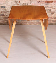 Load image into Gallery viewer, Mid Century Ercol drop-leaf beech dining table, circa 1960s
