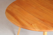 Load image into Gallery viewer, Mid Century Ercol drop-leaf beech dining table, circa 1960s
