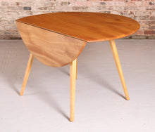 Load image into Gallery viewer, Mid Century Ercol drop-leaf beech dining table, circa 1960s
