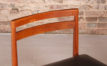 Load image into Gallery viewer, Set of 4 Mid Century teak chairs, circa 1970s.
