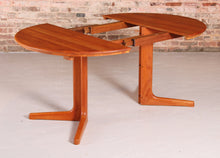 Load image into Gallery viewer, Mid Century Danish style extending solid teak dining table, circa 1970s
