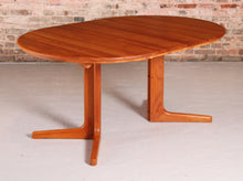 Load image into Gallery viewer, Mid Century Danish style extending solid teak dining table, circa 1970s
