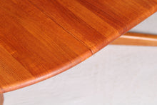 Load image into Gallery viewer, Mid Century Danish style extending solid teak dining table, circa 1970s
