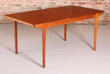 Load image into Gallery viewer, Mid Century extending teak dining table by McIntosh, circa 1960s.&nbsp;
