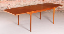 Load image into Gallery viewer, Mid Century extending teak dining table by McIntosh, circa 1960s.&nbsp;
