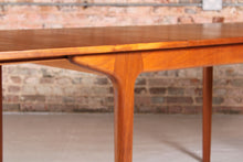 Load image into Gallery viewer, Mid Century extending teak dining table by McIntosh, circa 1960s.&nbsp;
