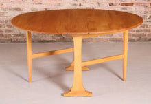 Load image into Gallery viewer, Mid Century Ercol model 610 gate leg dining table, circa 1970s
