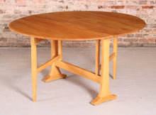 Load image into Gallery viewer, Mid Century Ercol model 610 gate leg dining table, circa 1970s
