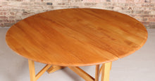 Load image into Gallery viewer, Mid Century Ercol model 610 gate leg dining table, circa 1970s
