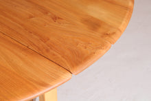 Load image into Gallery viewer, Mid Century Ercol model 610 gate leg dining table, circa 1970s
