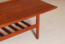 Load image into Gallery viewer, Danish Mid Century large teak coffee table with a magazine rack by Grete Jalk, circa 1960s

