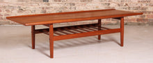 Load image into Gallery viewer, Danish Mid Century large teak coffee table with a magazine rack by Grete Jalk, circa 1960s
