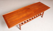 Load image into Gallery viewer, Danish Mid Century large teak coffee table with a magazine rack by Grete Jalk, circa 1960s
