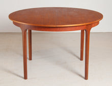 Load image into Gallery viewer, Mid Century round extending teak dining table by McIntosh, circa 1960s

