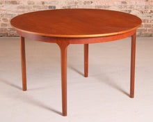 Load image into Gallery viewer, Mid Century round extending teak dining table by McIntosh, circa 1960s
