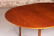 Load image into Gallery viewer, Mid Century round extending teak dining table by McIntosh, circa 1960s
