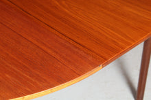 Load image into Gallery viewer, Mid Century round extending teak dining table by McIntosh, circa 1960s
