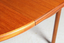 Load image into Gallery viewer, Mid Century round extending teak dining table by McIntosh, circa 1970s
